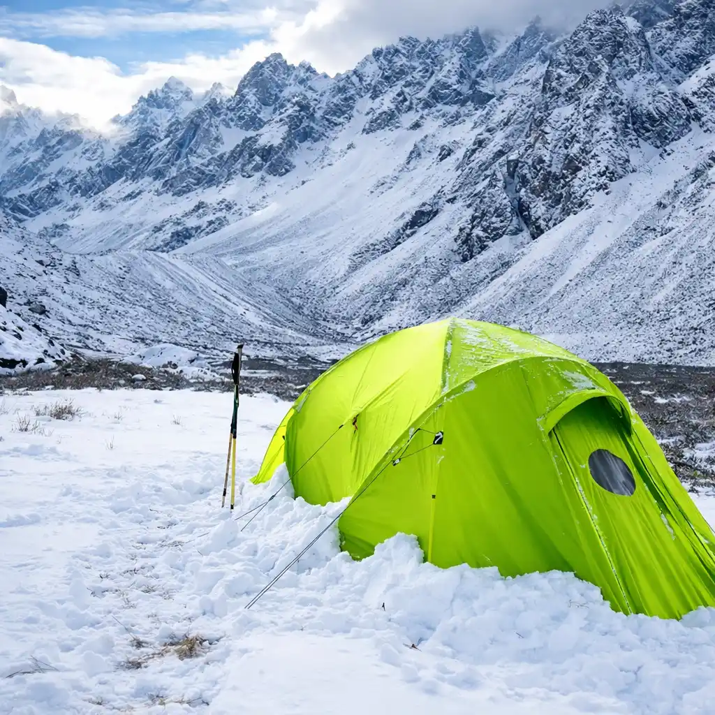 bright lime green 4-season tent in snowy mountain extreme winter conditions
