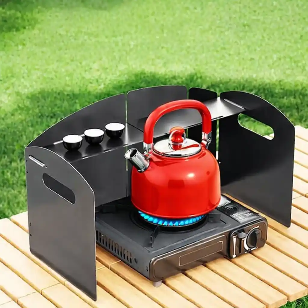 camping stove with wind shields blocking crosswinds