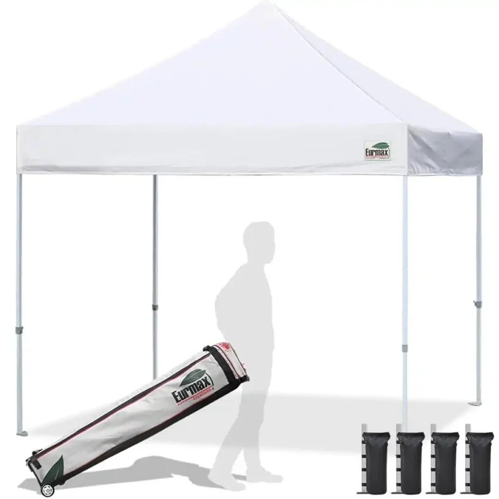 Eurmax 10x10 heavy-duty canopy standing firm in windy campsite conditions with reinforced steel frame