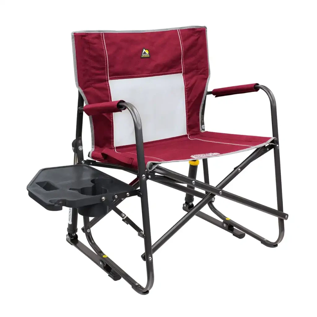GCI Outdoor Freestyle Rocker XL rocking chair beside a campsite fire ring