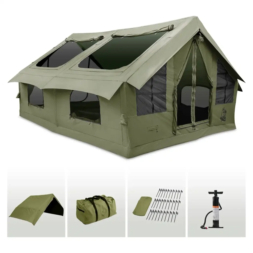 RBM Outdoors Inflatable Canvas Camping Tent pitched at a forest campsite during heavy rain, featuring a waterproof polycotton canvas design and inflatable air-frame